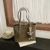 Bolso Retro de Gran Capacidad para Mujer 2026 Nuevo Bolso de Hombro Casual para el Trabajo y el Viaje Bolso Tote Texturizado Simple Versátil