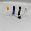 Botella de aceite esencial de vidrio coloreado de 10 ml al por mayor de fábrica, botella de vidrio con bola cosmética, gotero con cabezal de goma, botella de aceite esencial