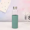 Copo de vidro de camada única novo para exportação, grande capacidade, tampa de bambu, copo bolha anti-queimadura, isolamento térmico, alça portátil, copo para acompanhar ao ar livre