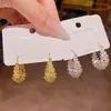 Pendientes metálicos plateados europeos y americanos para mujer, estilo nicho de lujo ligero de alta gama, ear cuffs extremadamente atractivos, pendientes populares en línea