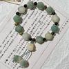 Pulsera de bodhi de flor flotante en polvo natural para hombres y mujeres camelia anillo individual pulsera de mano cuentas cuentas texto placa de juego cuerda venta al por mayor