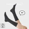 Calcetines de canalé liso de color sólido de lyocell para pantorrilla, adelgazantes y versátiles, estilo JK básico, calcetines sin costuras para mujer, disponibles para todas las estaciones, en stock transfronterizo