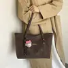 La popular bolsa de mano retro de este año para mujer, nuevo estilo Otoño 2026, color liso, simple, bolso de un solo hombro, para ir al trabajo, bolso de axila