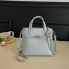 Bolso tipo cubo de nicho para mujer, nueva moda 2026, bolso de mano de un solo hombro cruzado, bolso elegante de alta gama para el día a día