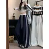 Foto real de los nuevos pantalones casuales holgados de diseño coreano para mujer de otoño 2026 con cordón en la cintura elástica y puños en los tobillos