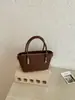 Elegante bolsa de palha trançada para mulheres, nova moda outono 2026, bolsa pequena versátil para o dia a dia, para usar na transversal