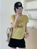 Top Casual Versátil de Algodón con Textura de Copo de Nieve para Mujer, Manga Corta, Manga Enrollable, Ropa para Mujer Shisanxing al por Mayor en Stock