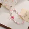 Creativo nuevo cordón anti-pérdida para cámara CCD con cuenta de mariposa estilo tinta china, charm versátil de estrella de cinco puntas para teléfono
