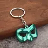 Llavero Colgante Máscara Película Linterna Verde al por mayor Colgante para Bolso de Hombre y Mujer Dibujo Animado Regalo Pequeño Máscara de Baile