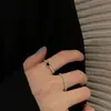 QINGSHE novo anel de quatro peças de borboleta grande e pequena anel de vento frio ins design de nicho feminino combinação de moda legal
