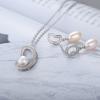 Pendientes colgantes de perlas verdes de nueva moda transfronteriza de plata de ley S925 con microcircón para mujer