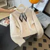 Cárdigan de punto de estilo suave para otoño e invierno con bufanda de seda y cintas para mujer, suave y acogedor, con cuello redondo y pequeños botones dorados, un suéter corto para usar como capa exterior, moderno