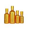 En stock frasco de cuenta dorada galvanizada columna de acero frasco de perfume cuenta de vidrio cosmético para masaje frasco de aceite esencial 30ml100ml