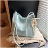 Bolsa de Ombro Único com Textura de Renda Estilo Coreano Feminina Nova Moda Primavera 2025 Bolsa Tote Bolsa de Mão Elegante Feminina Estilo Balde
