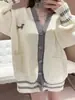 Chamarra suéter estilo universitario coreano 2026 otoño e invierno talla grande holgada casual nueva cardigan de punto con cuello en V