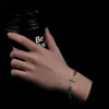 Pulsera de Acero de Titanio de Cuatro Hojas para Hombres, No se Desvanece, de Alta Gama, Joyería de Mano Simple y Versátil para Mujeres, Accesorios de Joyería con Diseño de Nicho
