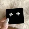 Pendientes de botón de flor de iris cepillada de plata de ley s925 Lujo Ligero Vintage Artesanía Pesada Moda Retro Nicho Diseño de Alta Gama Pendiente