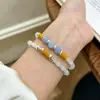Pulsera de Doble Círculo Aguamarina Fresca y Suave Estilo Chino para Mujer, Exquisita y Versátil, Apilable, con un Amuleto de Paz y Diseño de Anillo Corredizo