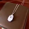 Conjunto de collar, aretes y anillo con colgante ovalado de circón - una colección de joyería lujosa y elegante con un estilo refinado y sofisticado, perfecta para un estilo versátil