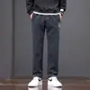 Moda masculina outono e inverno, calças versáteis de corte reto e folgado, calças esportivas casuais chinesas bordadas para homens jovens