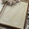 Versátil y que conserva el color, collar minimalista de lujo ligero bañado en oro de 14 quilates para mujer, nueva tendencia 2026, cadena para clavícula con lentejuelas a la moda