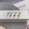Pendientes de Aro Cruzados de Metal de Moda de Nuevo Estilo Europeos y Americanos Pendientes Personalizados Accesorios Punk Accesorios para Chicas Geniales