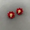 Pendientes de botón de margarita con diseño único de nicho, estilo de lujo ligero, pendientes versátiles y de alta gama de colores esmaltados