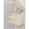 Bolso de Textura de Alta Calidad para Axila para Mujer Verano 2024 Nueva Moda Nicho Bolso Silla de Montar Vintage Bolso Cruzado de Hombro Versátil