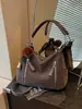 Bolsa feminina de grande capacidade transfronteiriça 2026 nova bolsa transversal estilo nicho para estudantes universitários bolsa de ombro bolsa tote para o dia a dia