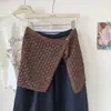 Artículo de Moda Coreano: Falda de Punto Hueca por Encaje con Diseño Único, Decoración de Botones, Efecto Adelgazante, Versátil para Mujeres