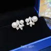 Brincos de pérola irregulares com design único, sensação de luxo leve e alta qualidade, brincos de tarraxa estilo japonês e coreano, brincos de zircônia versáteis e elegantes