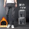 Pantalones vaqueros elásticos de otoño e invierno 2024 para hombre, pantalones ajustados ajustados, pantalones holgados de moda de estilo coreano para hombre, pantalones juveniles que combinan con todo.