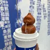 Suministro directo de fábrica marea nacional explosiva fuego viento té bebida tienda de té con leche tetera pequeña mini punta de dedo para fumar tetera pequeña de arena púrpura con mango