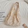 41083 Bolsa de Lona Floral Vazada Estilo Coreano Nicho Feminina Chegada Nova 2024 Grande Capacidade para Trabalho Bolsinha de Axila Bolsa de Ombro