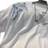 Camiseta de Manga Corta con Bordado Floral Estilo Americano para Hombre, Nuevo Modelo de Verano con Intrincado Relieve de Porcelana Azul y Blanca, Nuevo Top con Diseño Estilo Chino