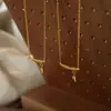 Nova corrente com pingente geométrico de bambu banhada a ouro 18K de aço titânio de alta qualidade, design simples de nicho transfronteiriço, joia feminina