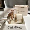 Dropshipping Bolso Cuadrado Pequeño de Alto Gama con Bloques de Color y Patrón de Lichi 2025 Nuevo Bolso de Mano Minimalista de Nicho al por Mayor