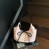 Bolso de Lazo Estilo Coreano para Mujer 2025 Nuevo Estilo Bolso Sencillo de Hombro o Axila Bolso de Mensajero de Moda Bolso de Mano para el Trabajo