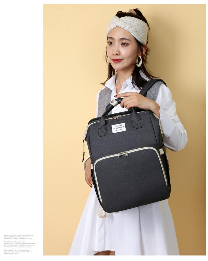 新款便携式折叠婴儿床16.jpg