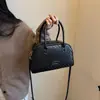 Bolso de bolos tejido retro moderno, gran capacidad, bolso de mano casual francés 2026, bolso de hombro y bandolera para mujer