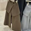 Pantalones de otoño e invierno para niñas 2026 nuevos pantalones largos gruesos con forro polar estilo coreano de pierna ancha pantalones de traje para niños casual