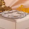 RAKOL Moda Luxo Leve Cobre Incrustado Zircônia Trevo de Quatro Folhas Aberto Ajustável Pulseira Feminina Nicho Toque de Alto Padrão Joia de Mão