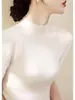 Nuevo estilo otoño temprano 2026, cuello semi-alto para mujer, manga tres cuartos, camiseta base de punto ajustada, top elegante de manga media
