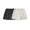 Nueva Falda de Lunares Blanco y Negro para Mujer, Nueva Falda Corta de Verano de Cintura Alta en Línea A, Ropa para Mujer al por Mayor Transfronteriza Verano 2026