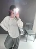 Foto real de camiseta de manga larga con cuello redondo y pedrería, a la moda y versátil, para mujer, nuevo estilo de otoño, top holgado y adelgazante con manga raglán 18619