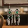 Novos Brincos de Comprimento Médio em Forma de Folha Estilo Étnico Brincos de Coração de Pêssego Personalidade Europeia e Americana Brincos de Yunnan Atacado