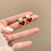 Pendientes retro coreanos de corazón burdeos para mujer, estilo Hepburn, de alta gama, de nicho, versátiles, con gota de aceite, al por mayor