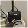 Bolsa Feminina Quadrada Pequena Cor Sólida Textura Nova 2025 Simples Casual Fivela de Travamento Estilo Coreano Nova Casual Uma Alça Transversal Portátil