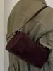 Bolso liso transfronterizo para mujer 2026 otoño nuevo elegante retro casual bolso cruzado bolso de mano de un solo hombro bolso cilíndrico