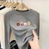 Camiseta de manga larga de forro polar para niña, nuevo estilo otoño e invierno 2026, ropa interior para niños, camiseta base cepillada, moderna